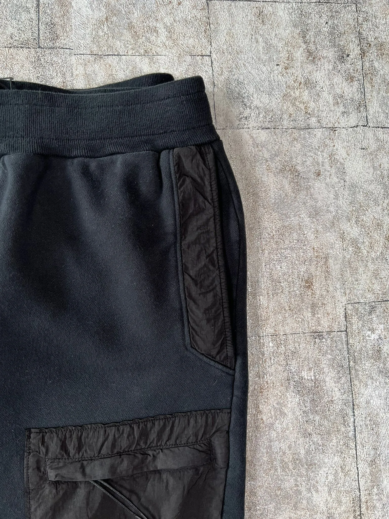 C.P. COMPANY MIX LENS SWEATPANTS